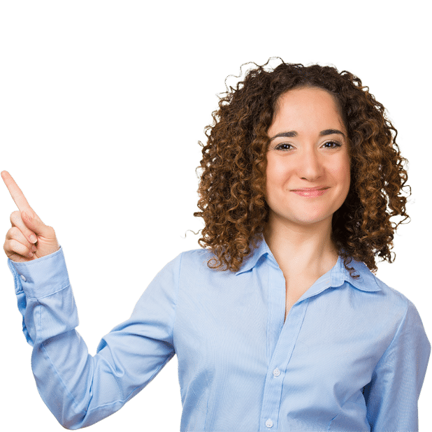 This image features a smiling individual in a light blue shirt, gesturing with their finger as if pointing towards a concept or information. It conveys a welcoming and professional tone, aligning with the idea of private event planning at RingSpaces of Fredericksburg. The gesture and expression suggest enthusiasm and readiness to assist with event planning needs.